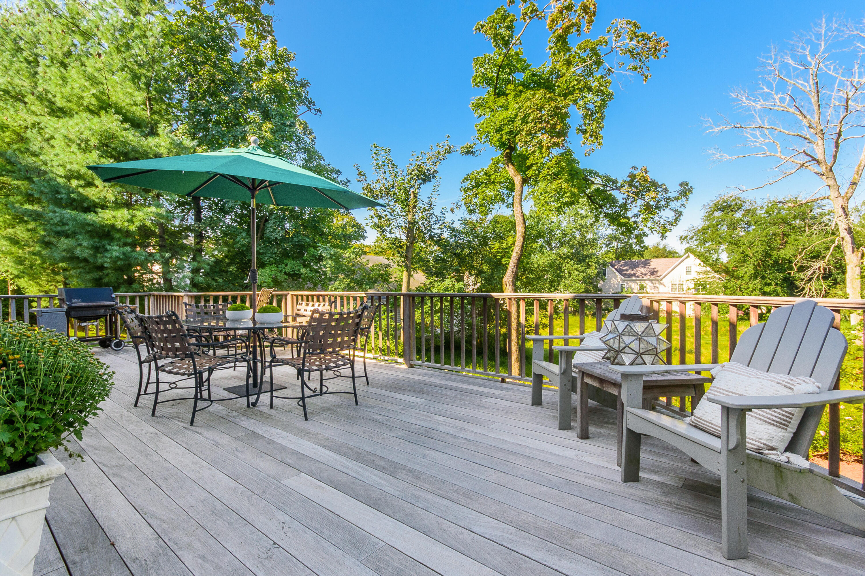 2 Hedge Row Darien, CT 06820 - Photo 31 of 38 a view of a chairs and table on the wooden deck