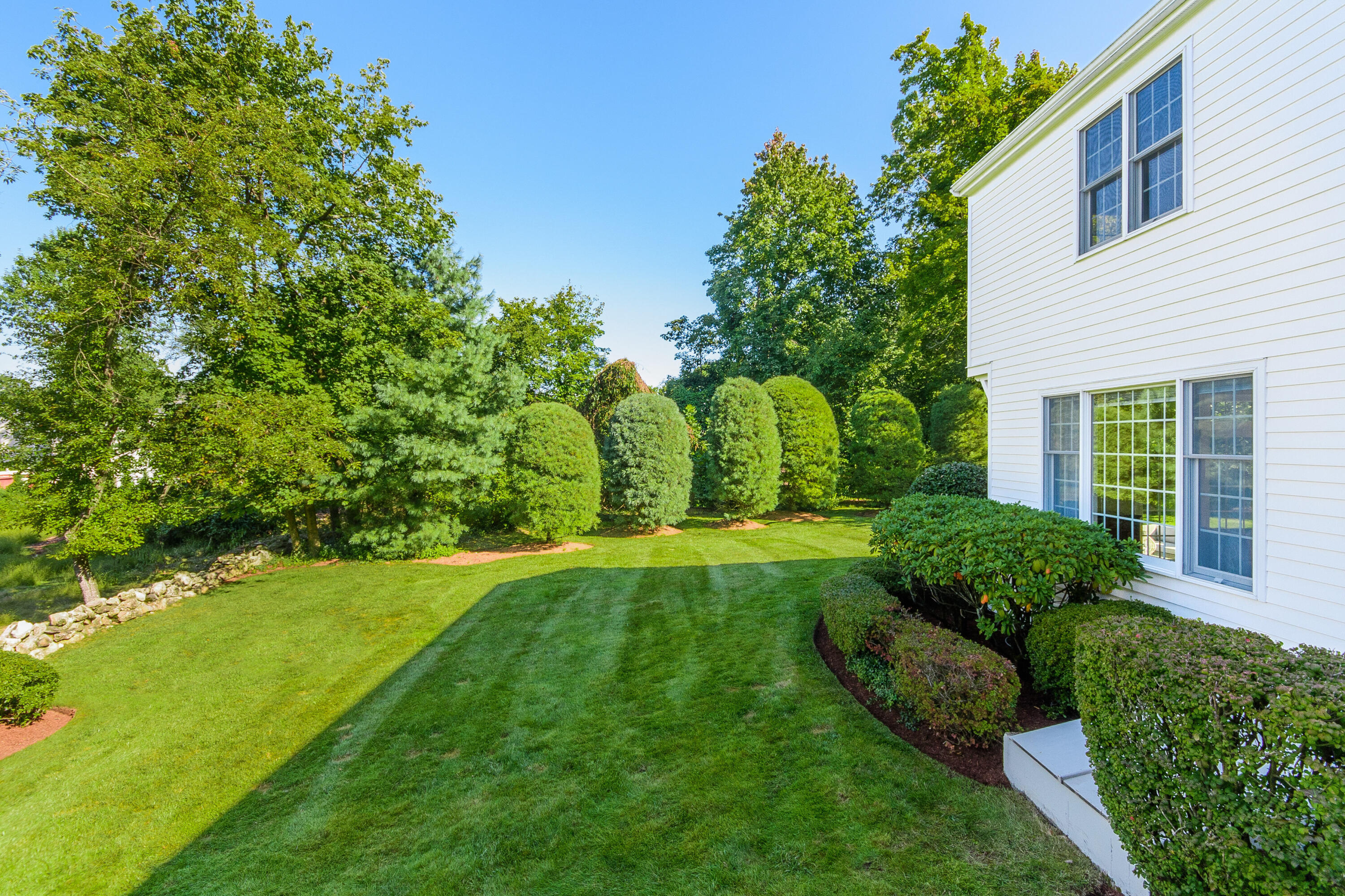 2 Hedge Row Darien, CT 06820 - Photo 33 of 38 a view of a house with a backyard