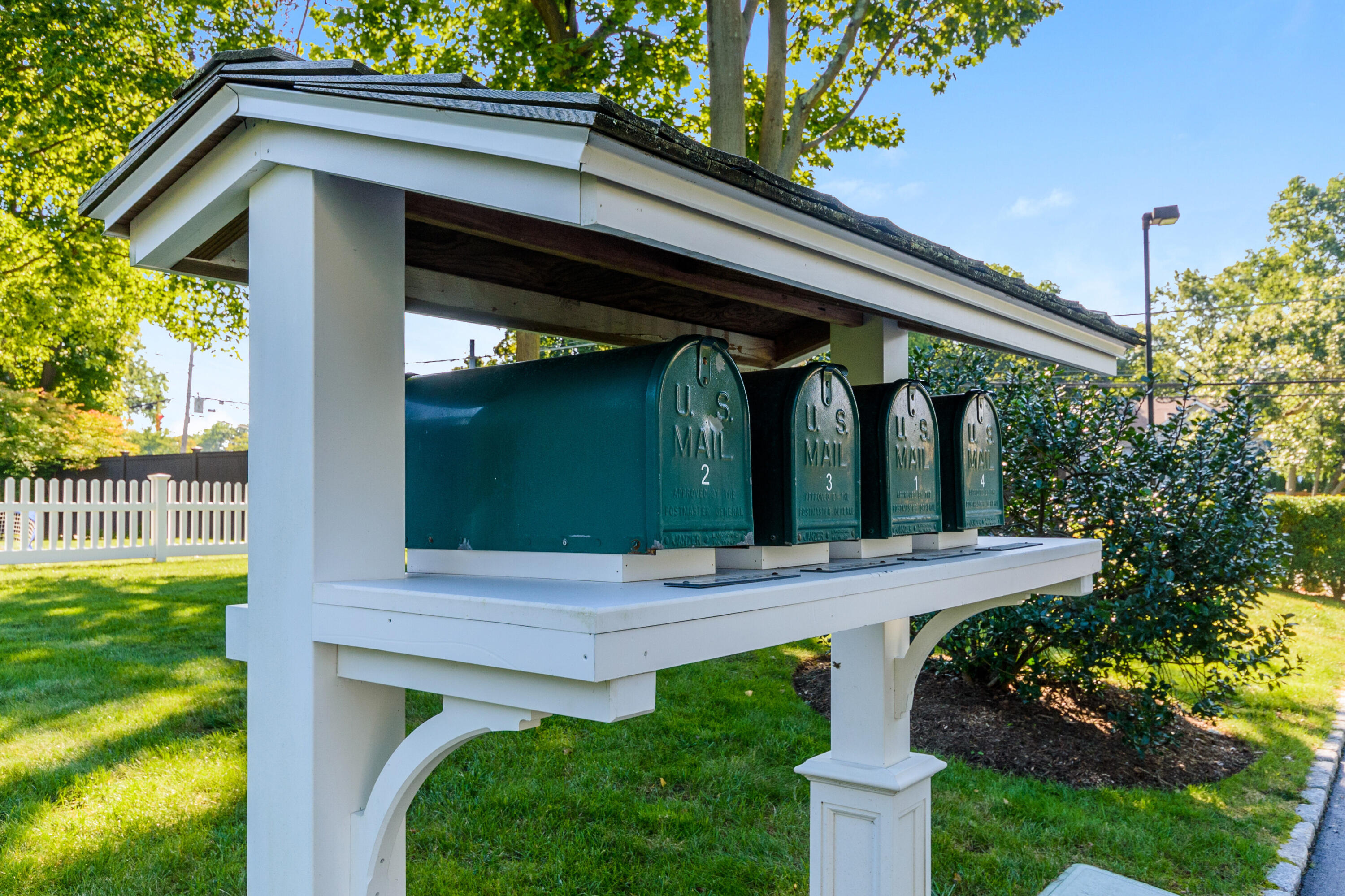 2 Hedge Row Darien, CT 06820 - Photo 34 of 38 a view of a house with a small yard plants and large tree