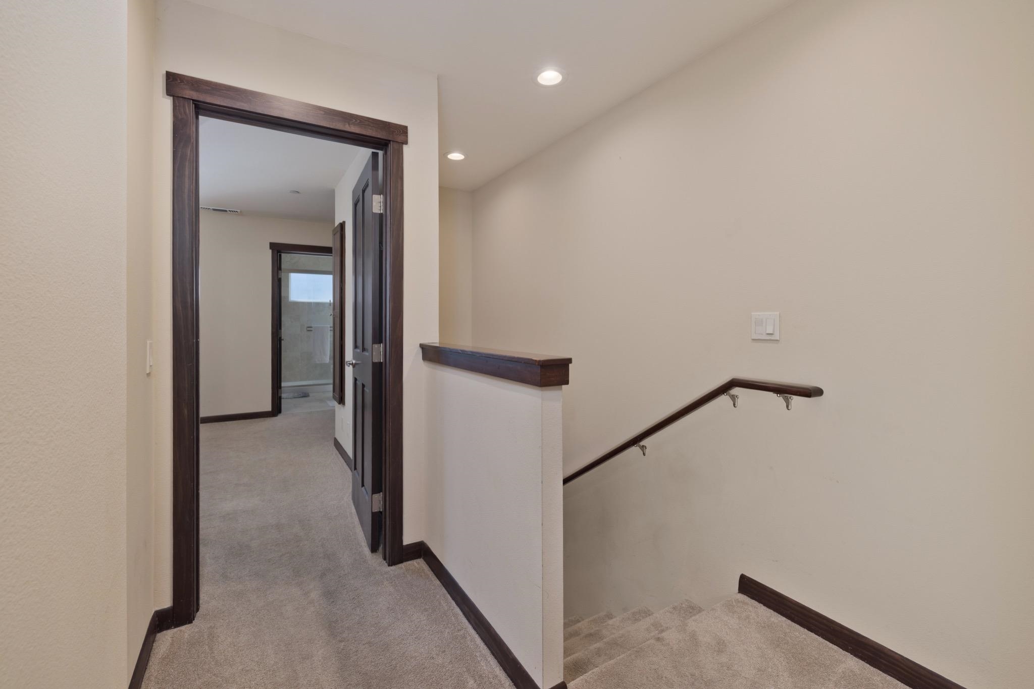 28 Oak Tree Way, Unit 8 Mammoth Lakes, CA 93546 - Photo 16 of 32 Hall featuring an upstairs landing, light carpet, and recessed lighting
