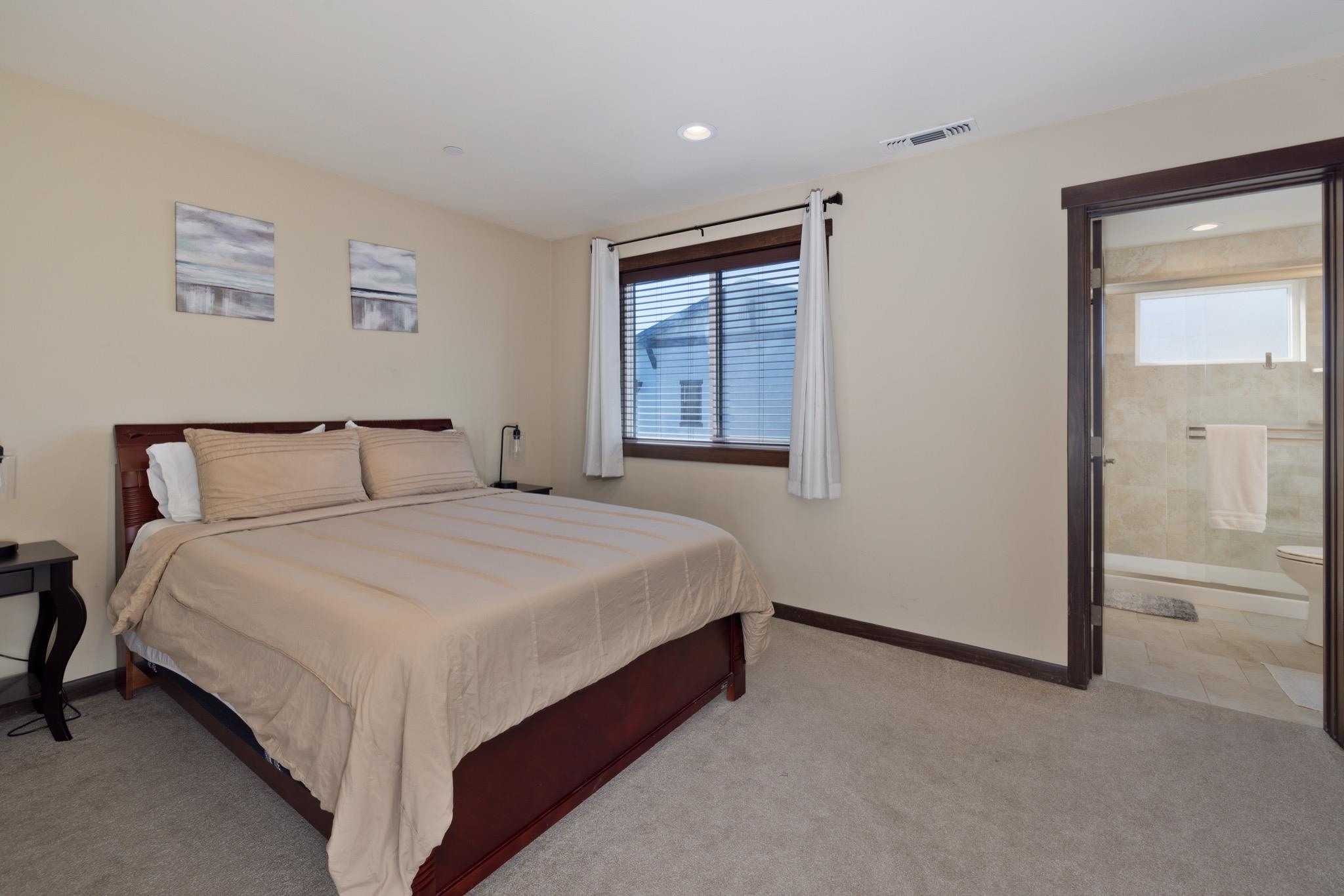 28 Oak Tree Way, Unit 8 Mammoth Lakes, CA 93546 - Photo 17 of 32 Bedroom featuring light carpet, recessed lighting, and ensuite bath