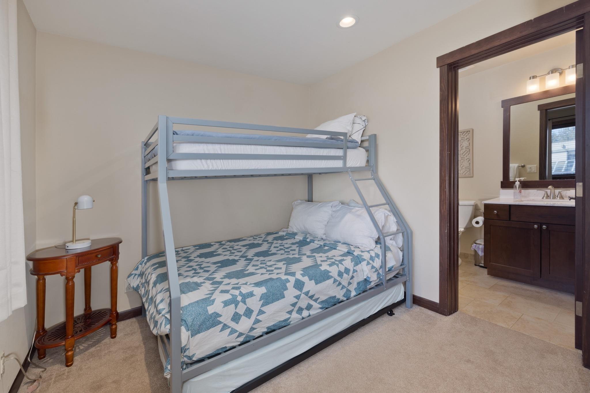 28 Oak Tree Way, Unit 8 Mammoth Lakes, CA 93546 - Photo 24 of 32 Bedroom with ensuite bathroom, light carpet, and recessed lighting