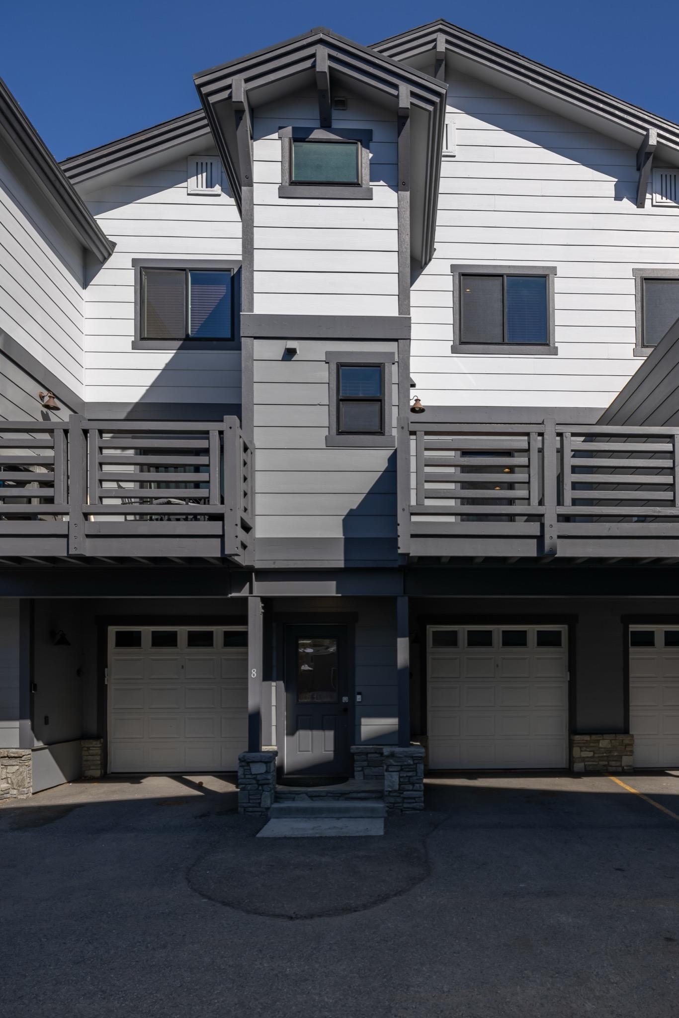 28 Oak Tree Way, Unit 8 Mammoth Lakes, CA 93546 - Photo 31 of 32 Exterior space with a balcony and an attached garage