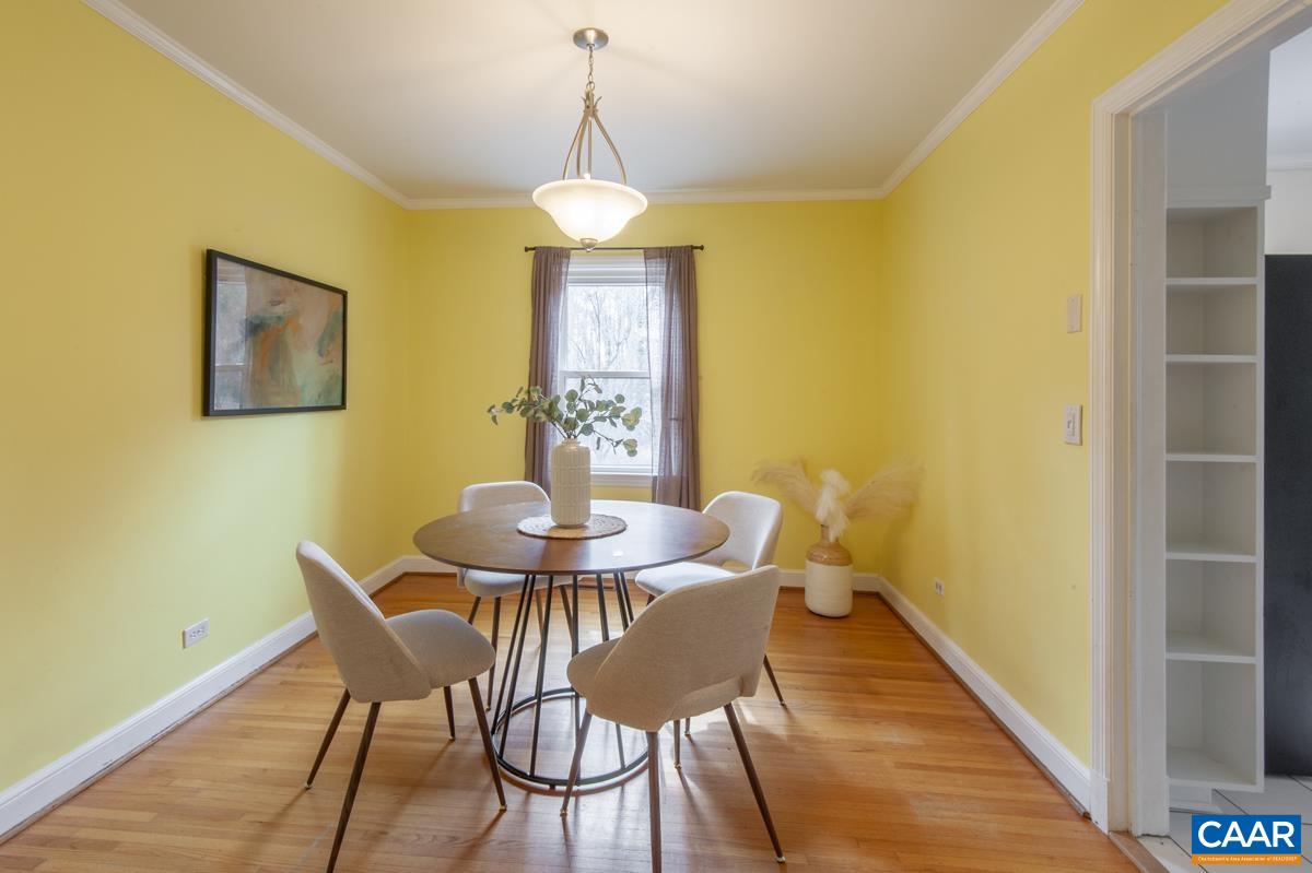 1606 Grove Road Charlottesville, VA 22901 - Photo 15 of 52 a view of a dining room with furniture and wooden floor