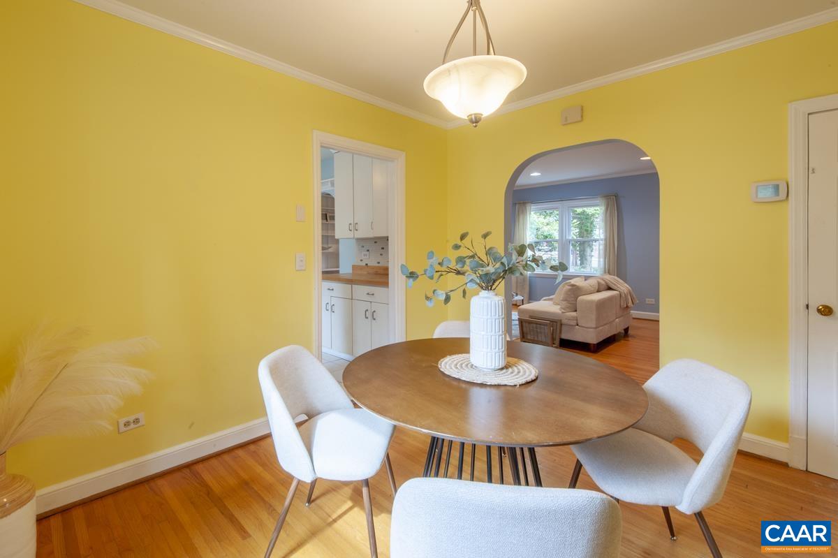 1606 Grove Road Charlottesville, VA 22901 - Photo 16 of 52 a view of a dining room with furniture and a chandelier