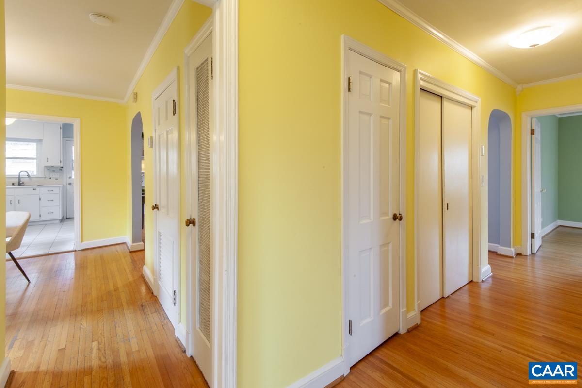 1606 Grove Road Charlottesville, VA 22901 - Photo 17 of 52 a view of a bathroom with wooden floor and staircase