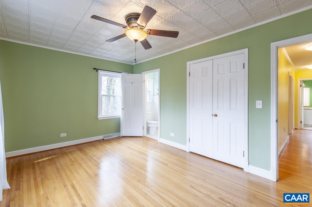 1606 Grove Road Charlottesville, VA 22901 - Photo 18 of 52 a view of room with window ceiling fan and hardwood floor