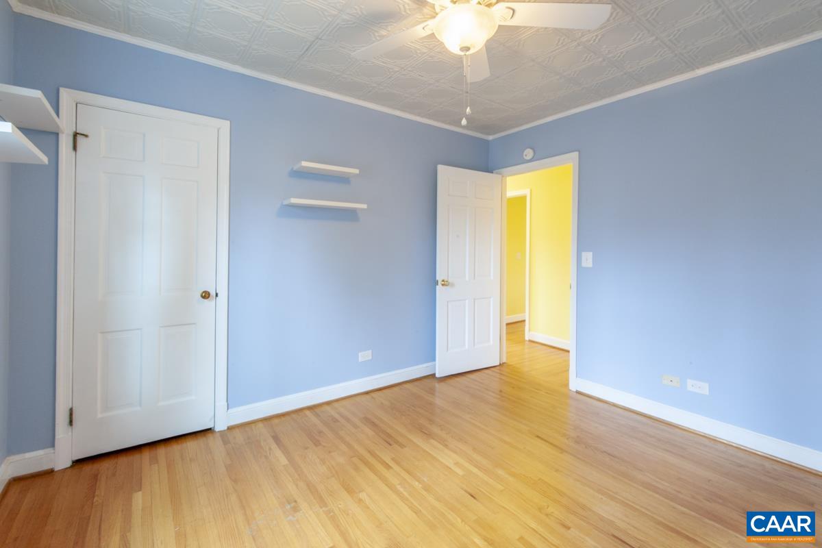 1606 Grove Road Charlottesville, VA 22901 - Photo 23 of 52 a view of empty room with wooden floor and fan