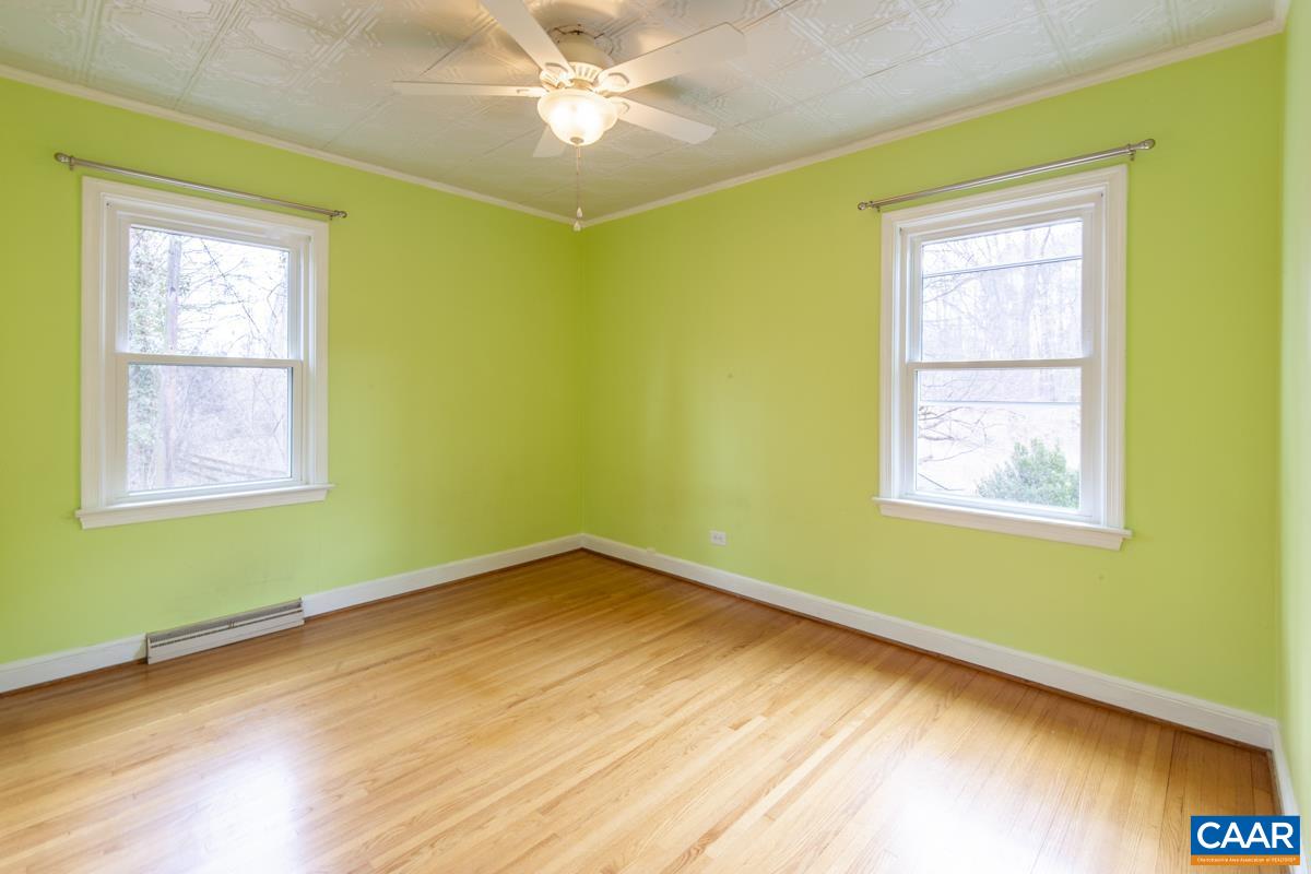 1606 Grove Road Charlottesville, VA 22901 - Photo 24 of 52 a view of a room with wooden floor and windows