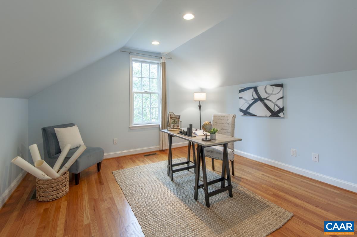 1606 Grove Road Charlottesville, VA 22901 - Photo 29 of 52 a view of a livingroom with furniture and wooden floor