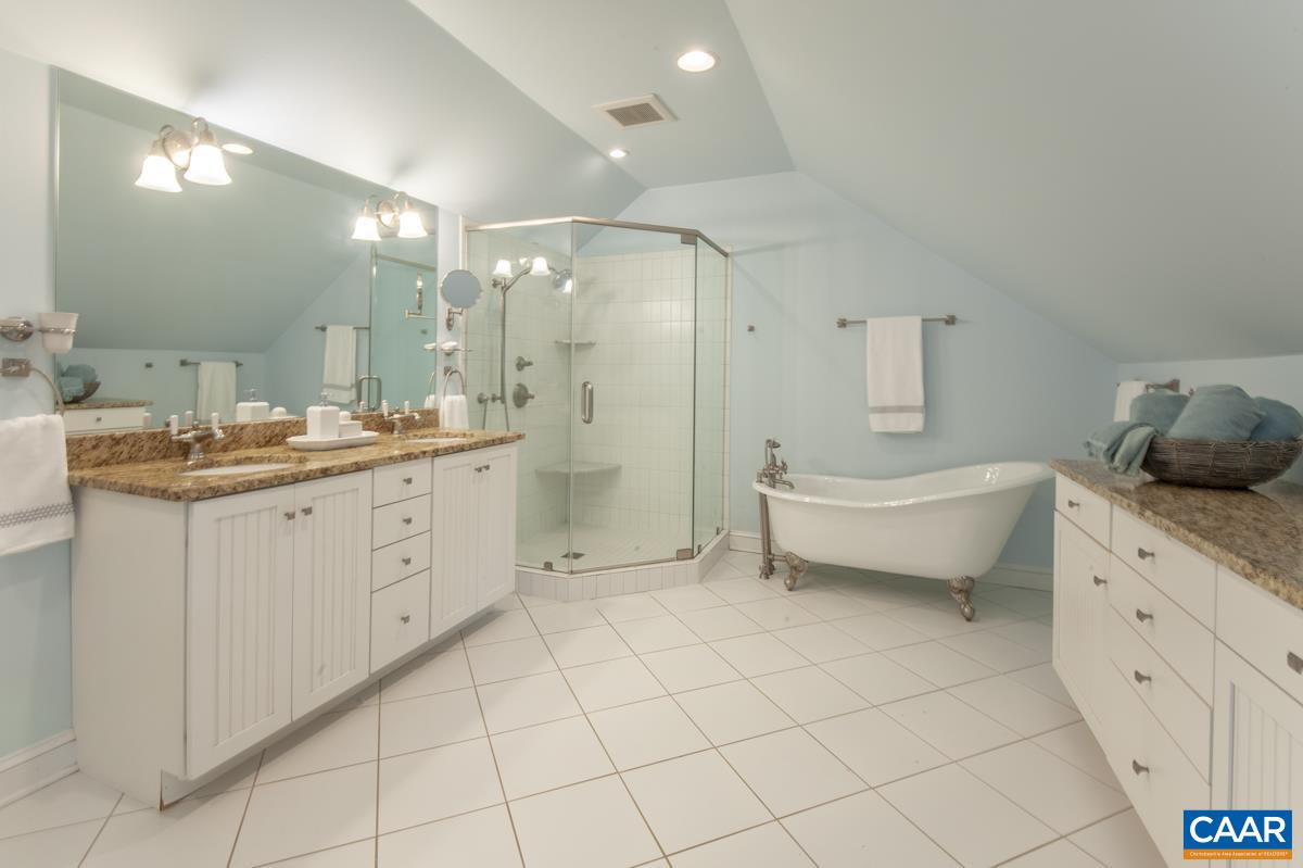 1606 Grove Road Charlottesville, VA 22901 - Photo 32 of 52 a bathroom with a double vanity sink mirror and toilet
