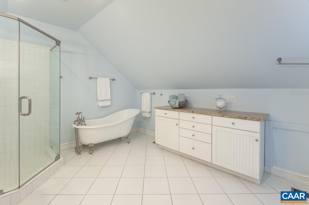 1606 Grove Road Charlottesville, VA 22901 - Photo 33 of 52 a spacious bathroom with a bathtub sink and toilet