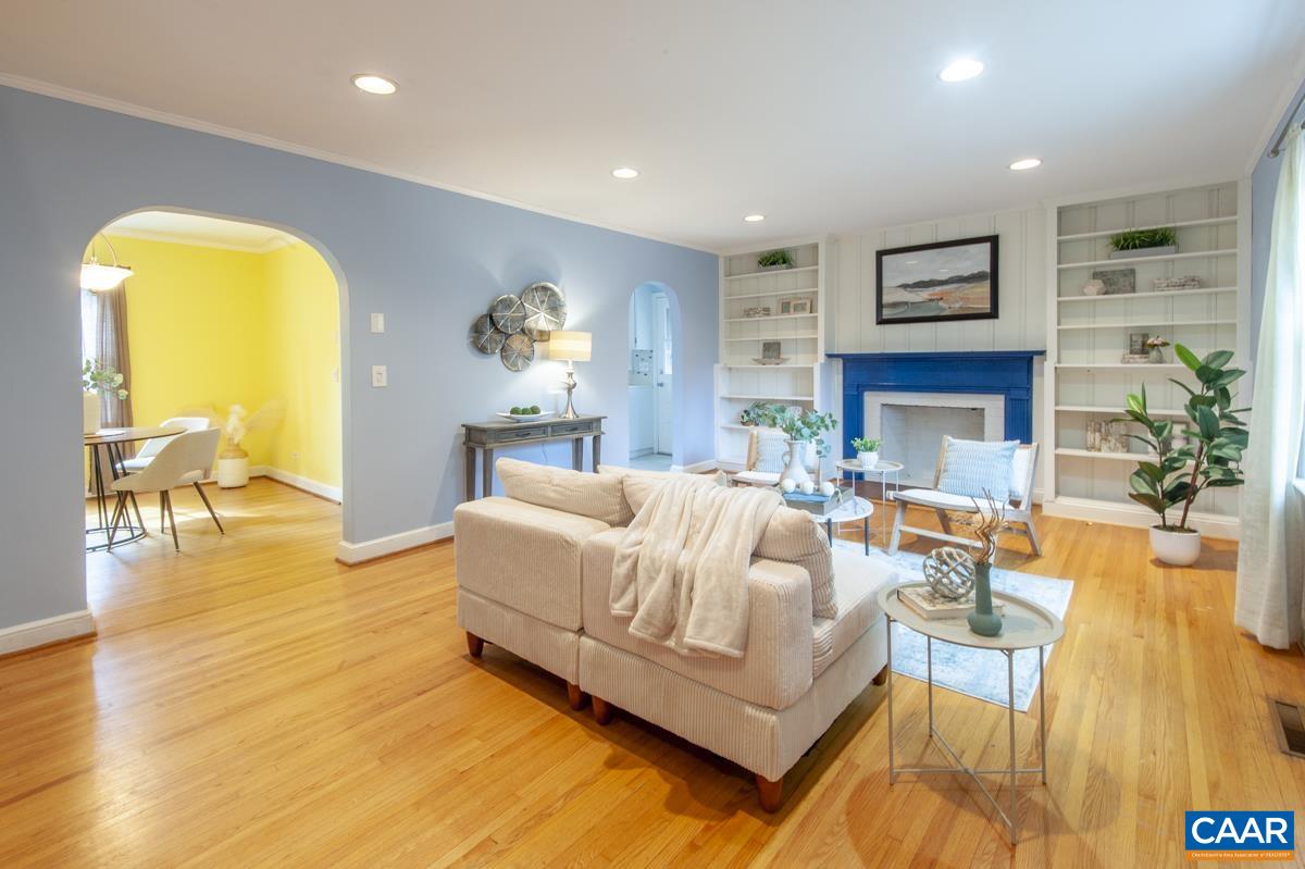1606 Grove Road Charlottesville, VA 22901 - Photo 6 of 52 a living room with furniture and a fireplace