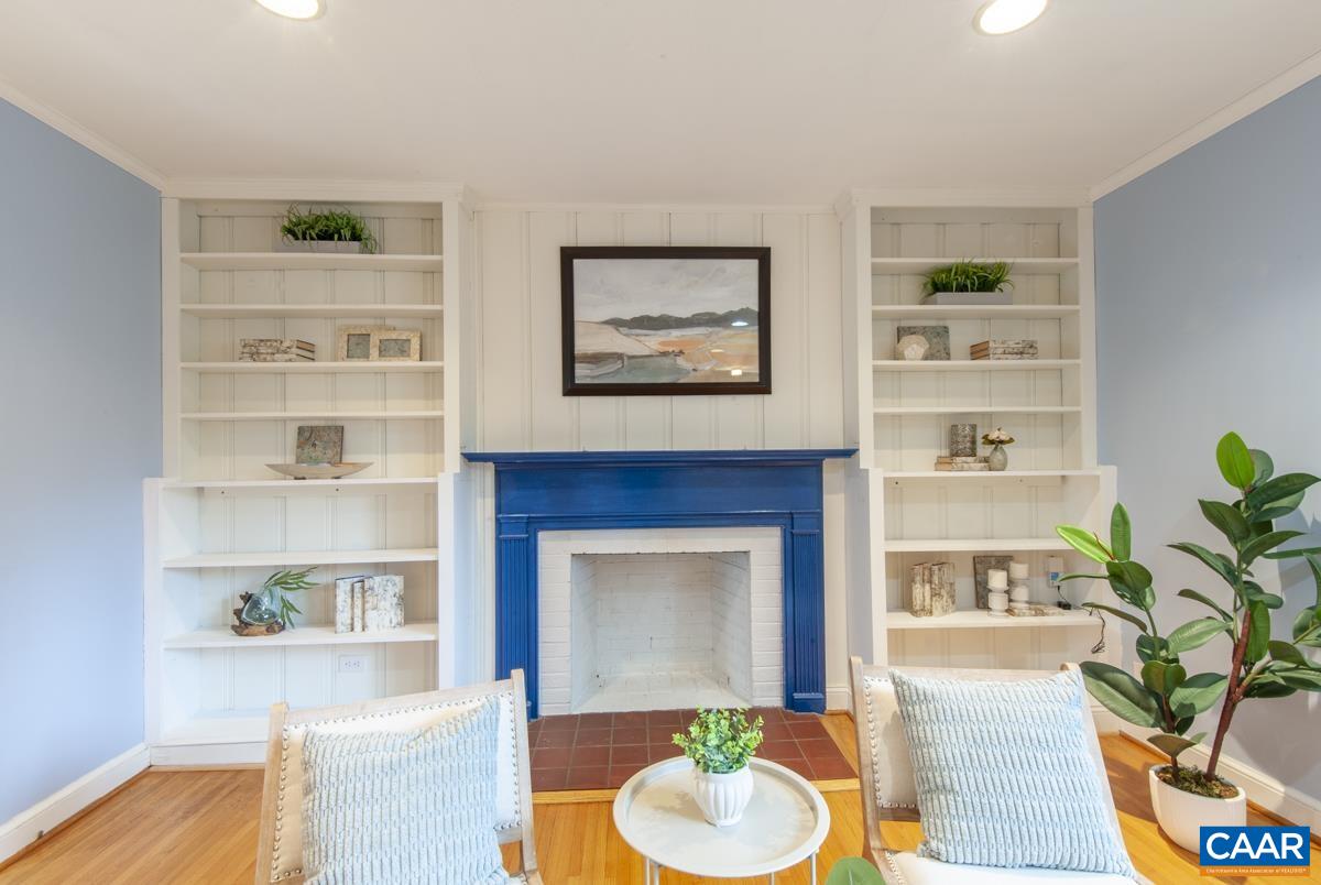 1606 Grove Road Charlottesville, VA 22901 - Photo 9 of 52 a living room with furniture and a fireplace