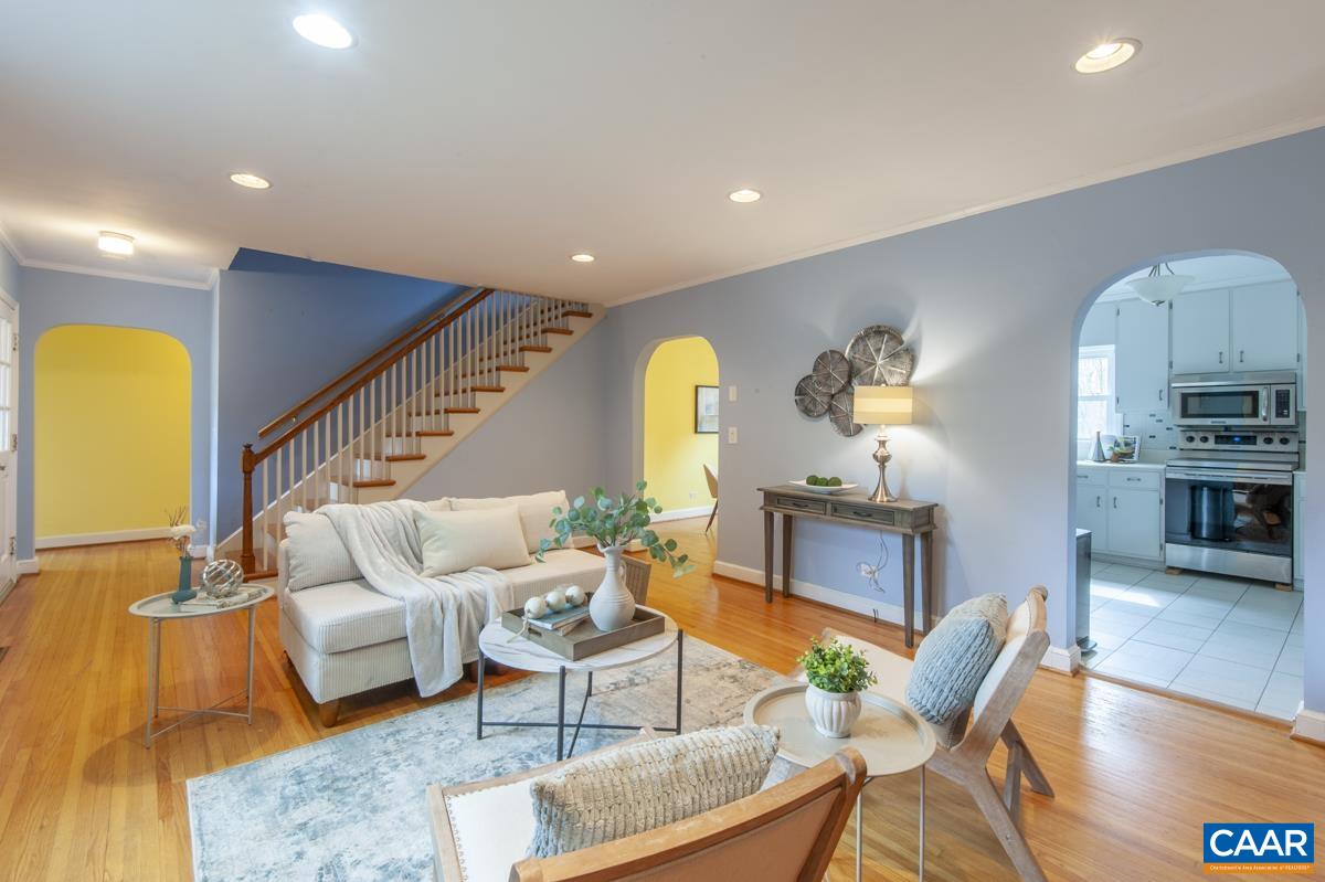 1606 Grove Road Charlottesville, VA 22901 - Photo 10 of 52 a living room with furniture fireplace and a table