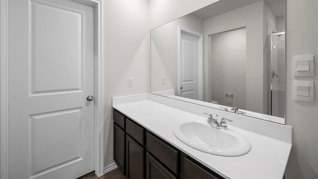 1913 Freeman Street Tyler, TX 75704 - Photo 9 of 21 Bathroom with vanity and a stall shower