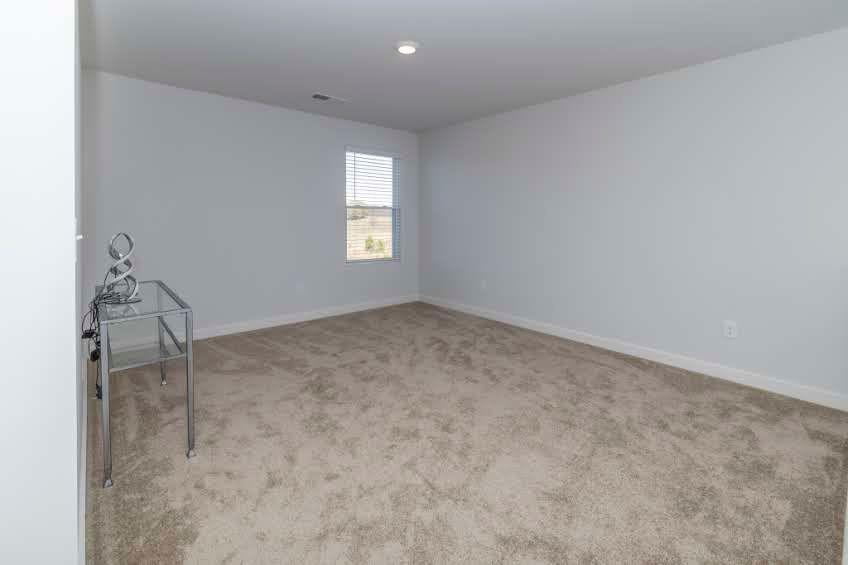 244 Overlook Road Covington, GA 30014 - Photo 16 of 24 an empty room with a window