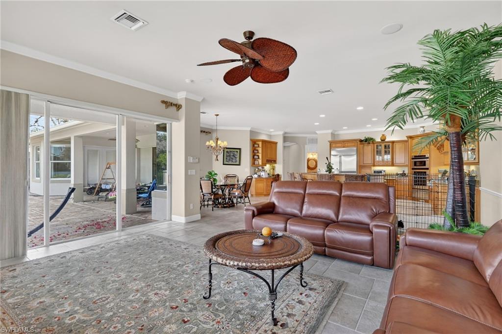 1964 Rialto Way Alva, FL 33920 - Photo 10 of 50 a living room with furniture and a large window