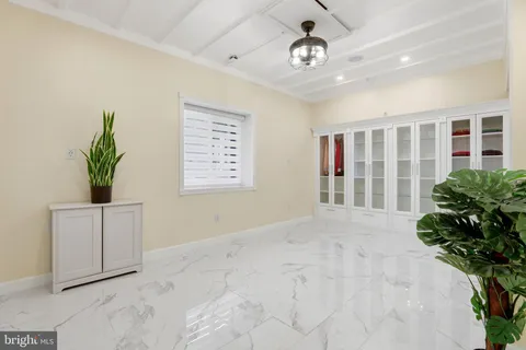 a utility room with sink dryer and washer