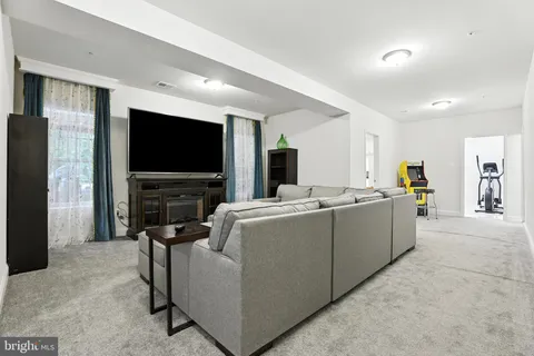 a kitchen with a stove and a fireplace