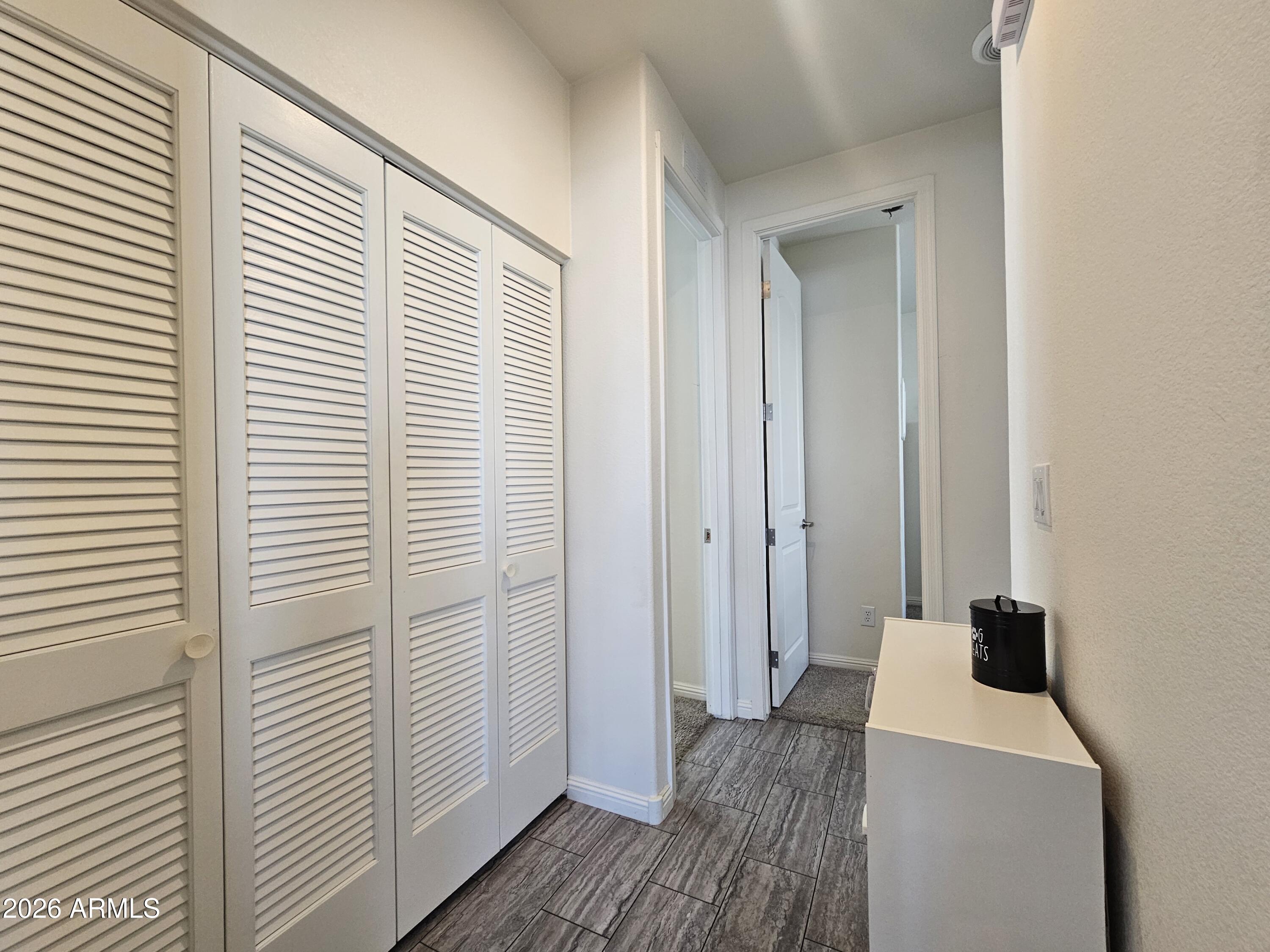 650 North Hawes Road, Unit 3331 Mesa, AZ 85207 - Photo 13 of 38 a room with a bed and a window