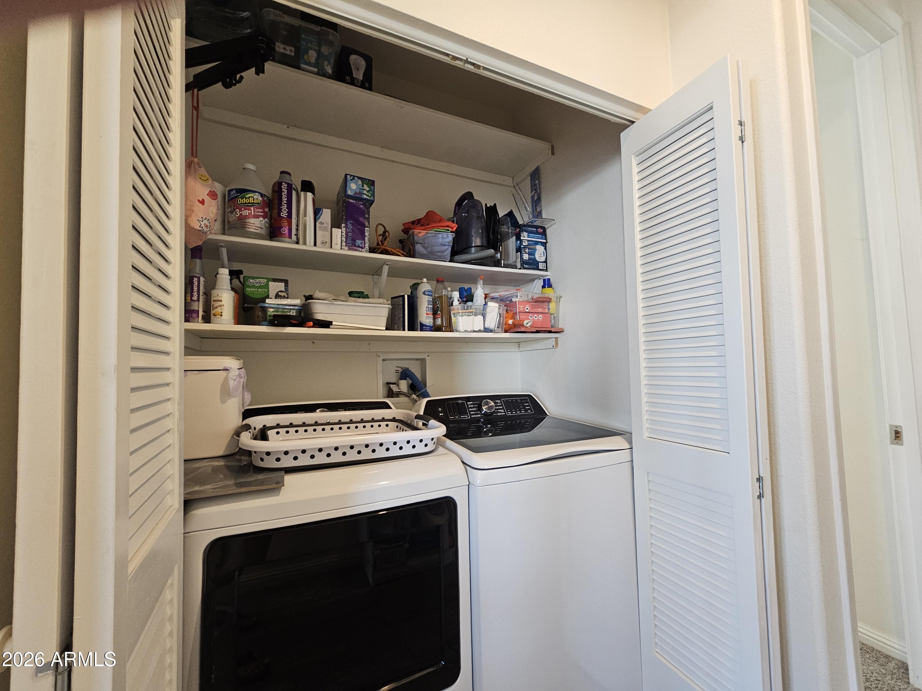 650 North Hawes Road, Unit 3331 Mesa, AZ 85207 - Photo 14 of 38 a utility room with dryer and washer