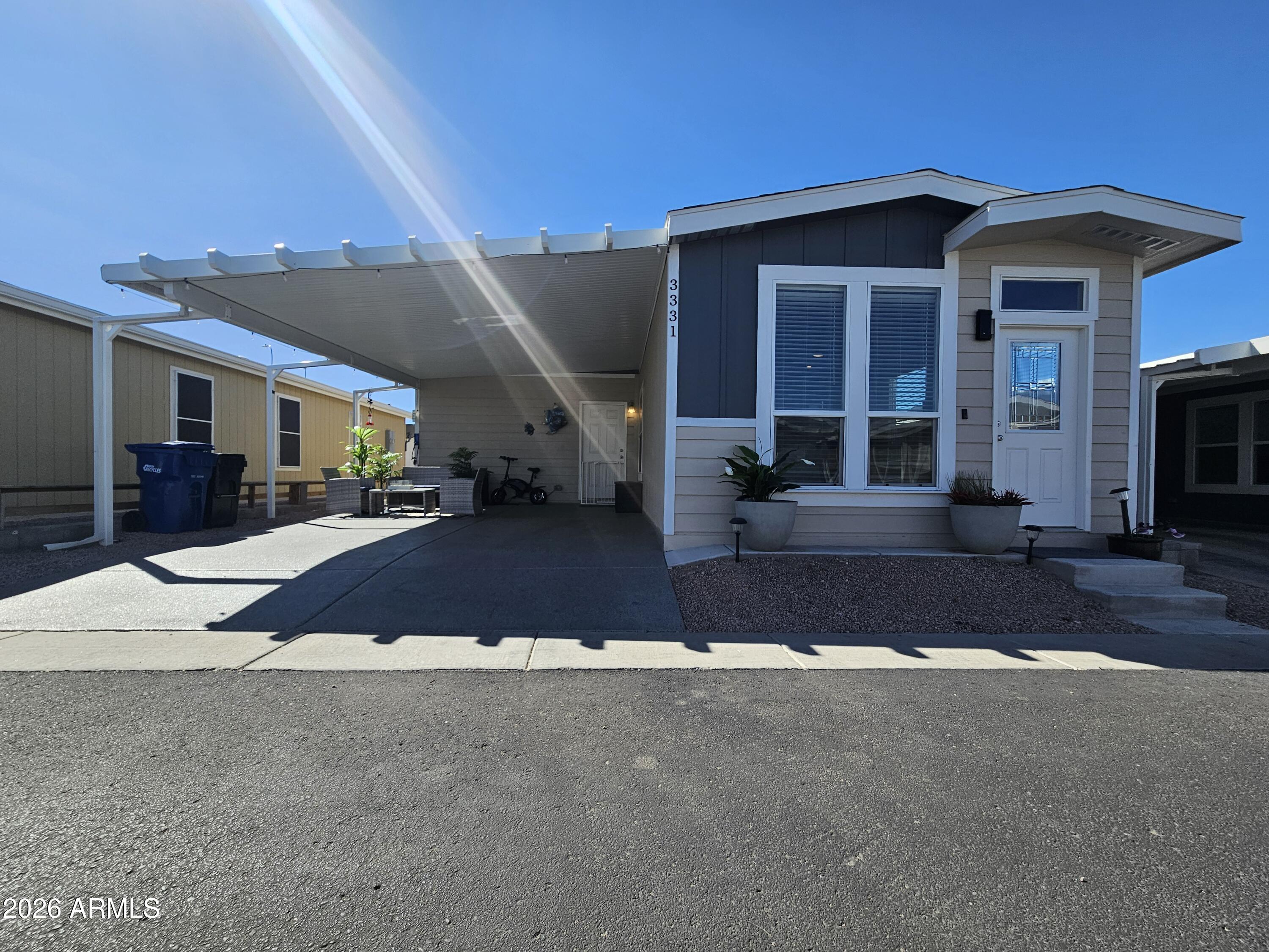 650 North Hawes Road, Unit 3331 Mesa, AZ 85207 - Photo 6 of 38 a front view of a house with a yard
