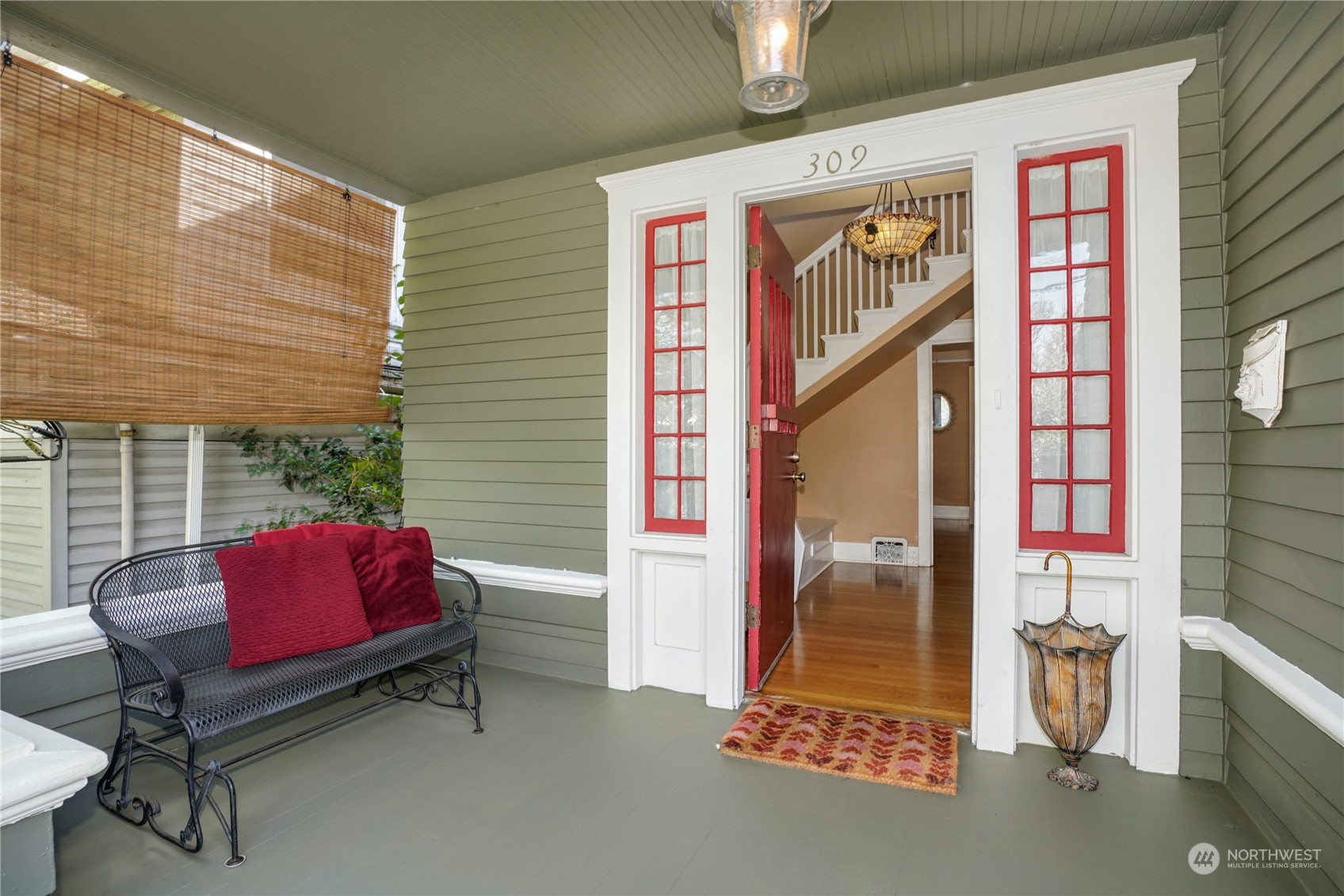 309 North 73rd Street Seattle, WA 98103 - Photo 2 of 30 a bench sitting in front of a building