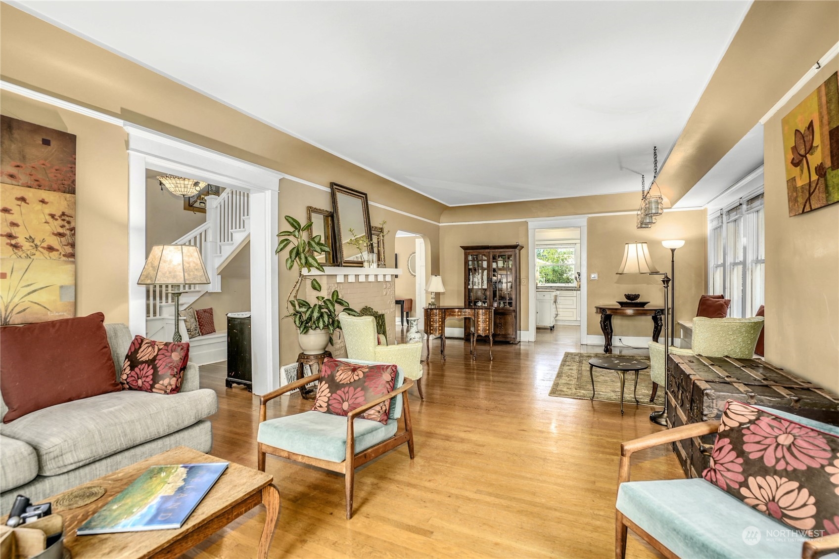 309 North 73rd Street Seattle, WA 98103 - Photo 5 of 30 a living room with furniture and wooden floor