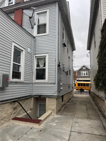 a view of a building with sitting area
