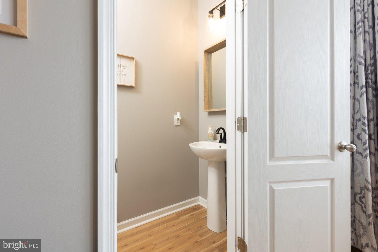 47 Landis Court Falling Waters, WV 25419 - Photo 12 of 35 a bathroom with a sink and mirror