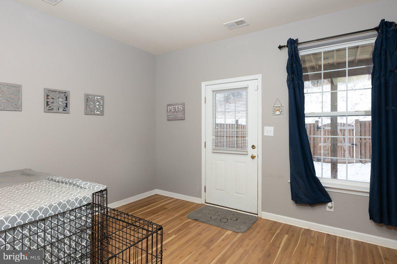 47 Landis Court Falling Waters, WV 25419 - Photo 20 of 35 a bedroom with a bed and a window