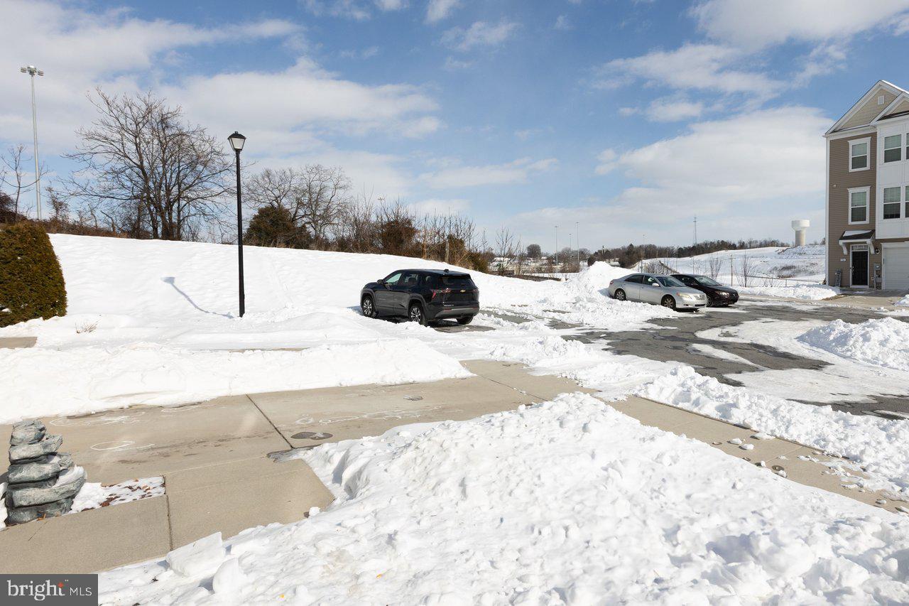 47 Landis Court Falling Waters, WV 25419 - Photo 25 of 35 a view of a road with snow on the road