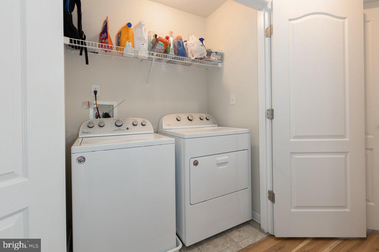 47 Landis Court Falling Waters, WV 25419 - Photo 27 of 35 a utility room with dryer and washer