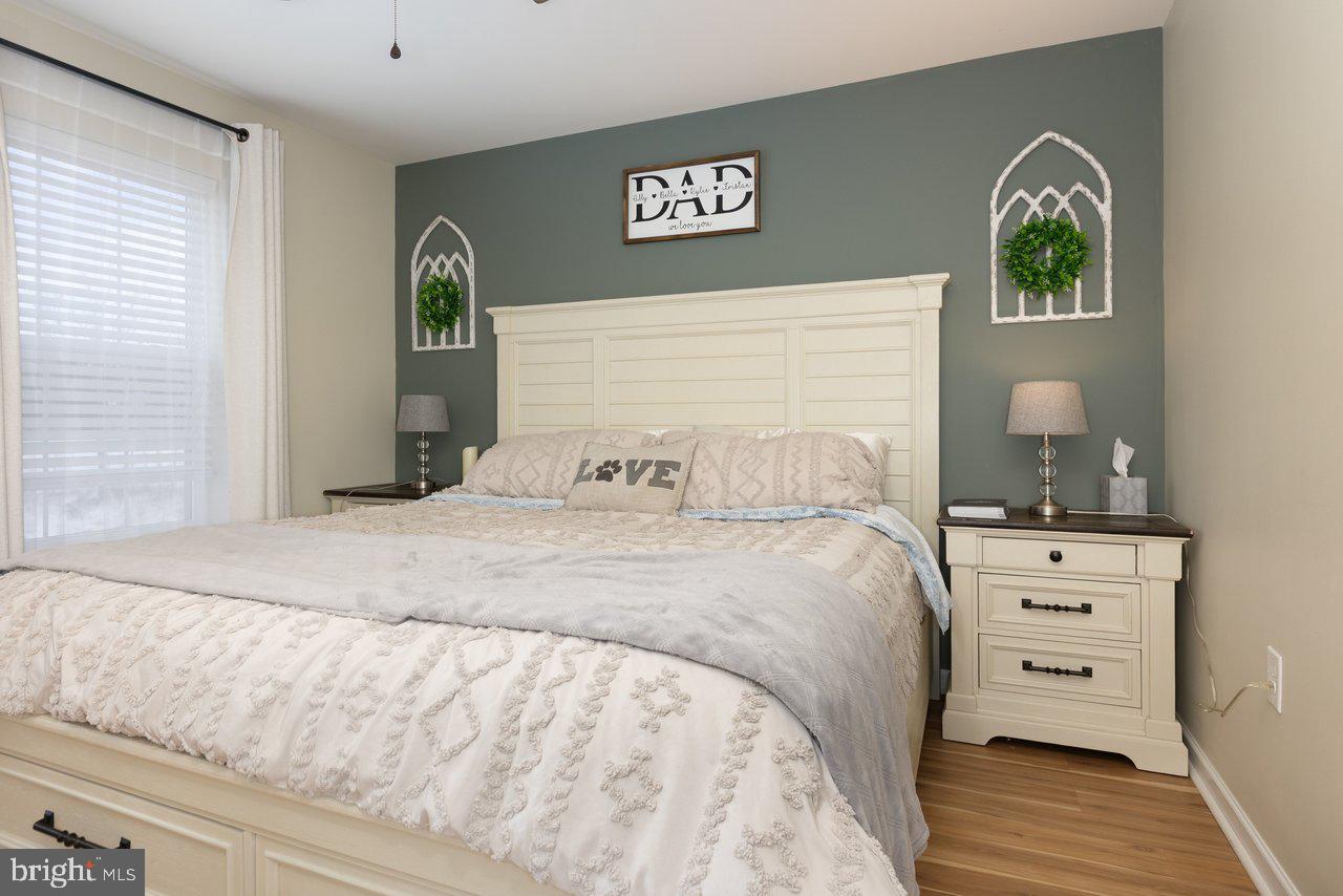 47 Landis Court Falling Waters, WV 25419 - Photo 31 of 35 a bedroom with a bed and a dresser