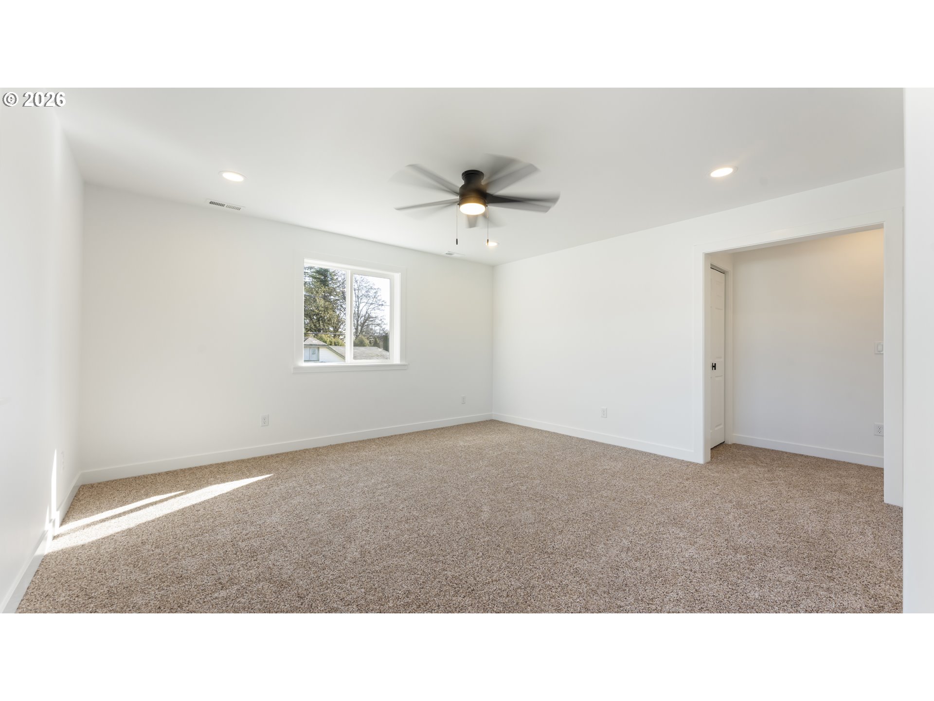 141 Northeast D Street Willamina, OR 97396 - Photo 21 of 43 a open hall with a ceiling fan and a window