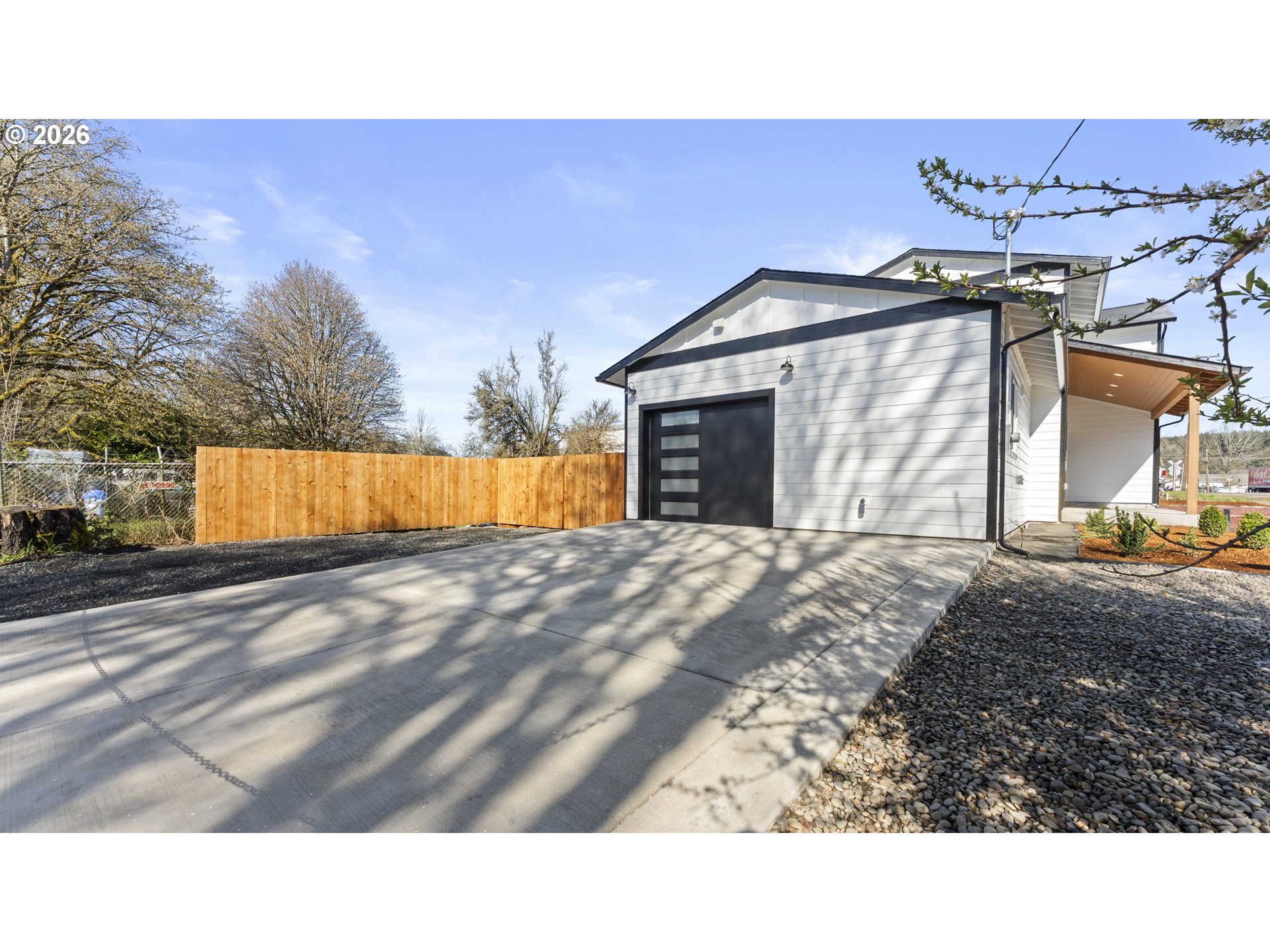 141 Northeast D Street Willamina, OR 97396 - Photo 4 of 43 a view of a backyard of the house