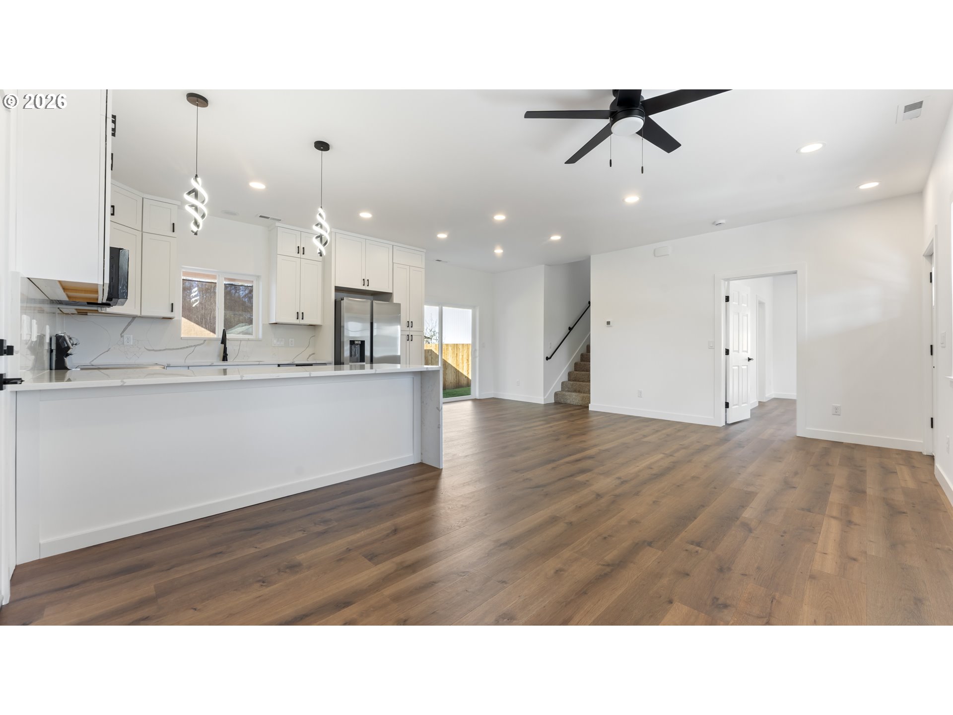 141 Northeast D Street Willamina, OR 97396 - Photo 7 of 43 a kitchen with a sink appliances and cabinets