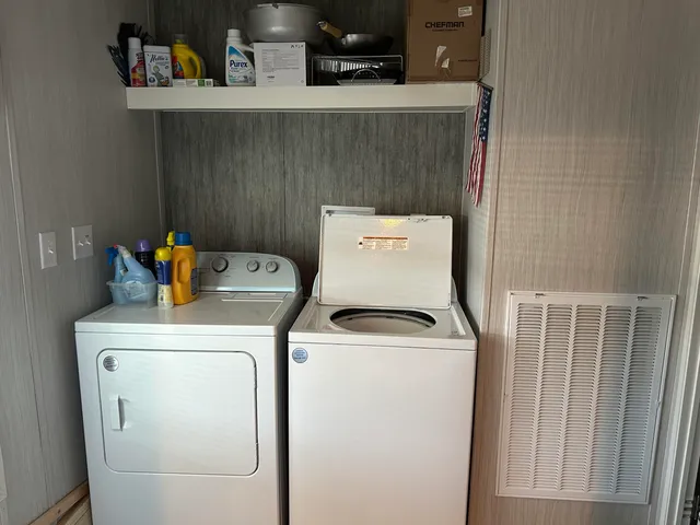 a view of swimming pool with a tub and a porch