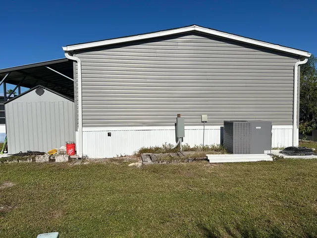 a front view of a house with garage