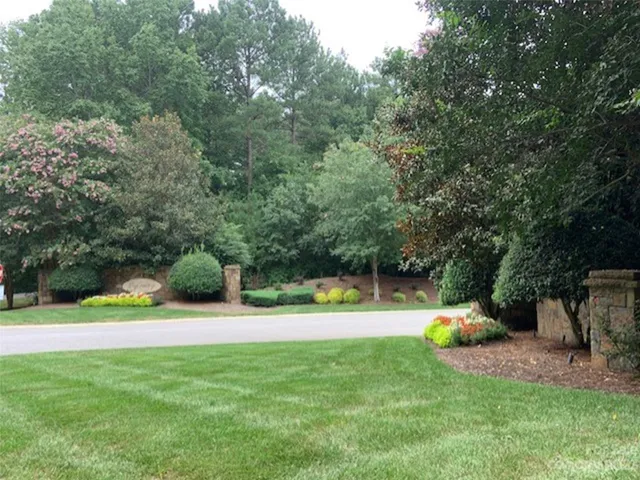 a view of a garden with houses