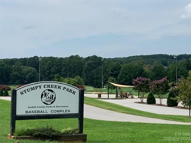 a view of a park with welcome board
