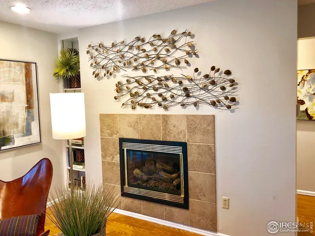 a living room with a fireplace