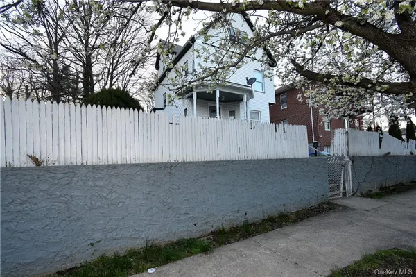 a house with trees in front of it