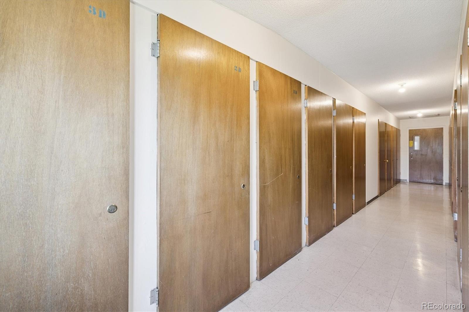 9155 Center Avenue, Unit 2D Denver, CO 80247 - Photo 16 of 50 a view of a hallway