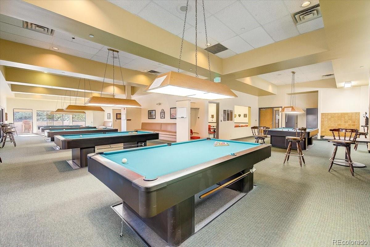 9155 Center Avenue, Unit 2D Denver, CO 80247 - Photo 38 of 50 a room with pool table and windows