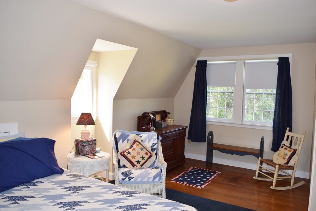 309 Red Acre Road Stow, MA 01775 - Photo 14 of 26 a living room with a couch and a table