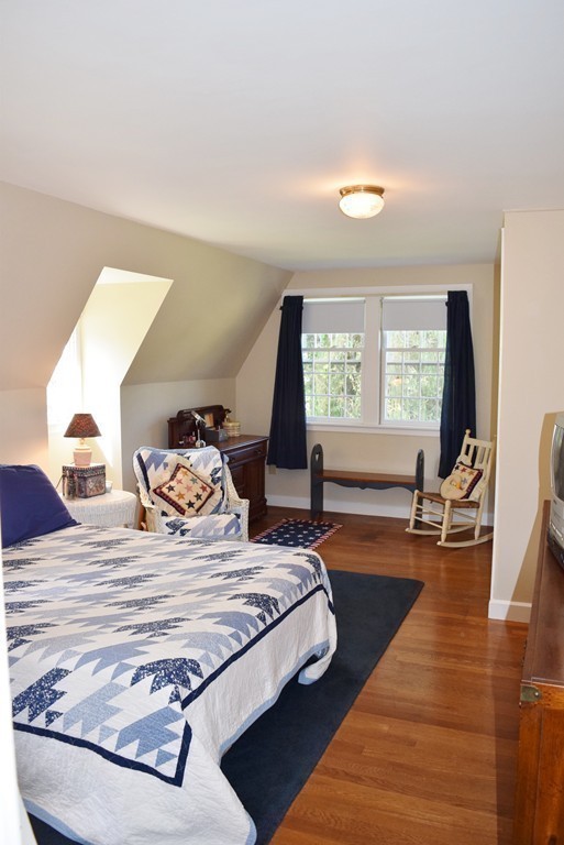 309 Red Acre Road Stow, MA 01775 - Photo 15 of 26 a bedroom with double bed and a large window