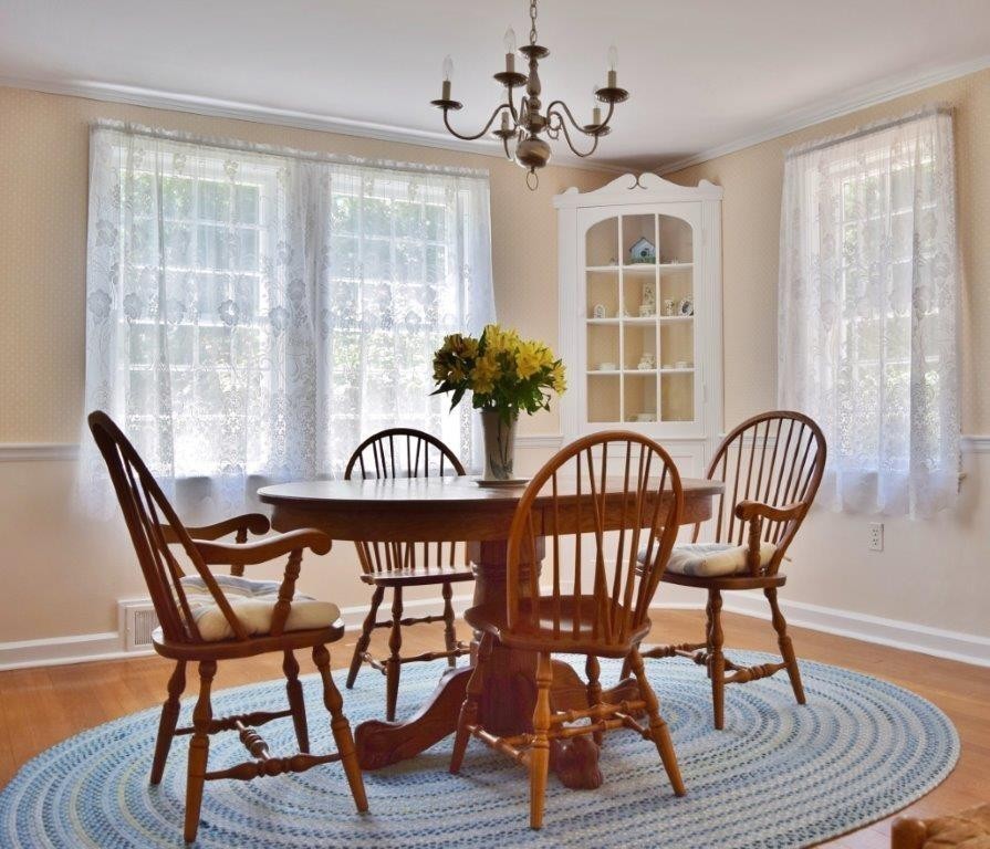 309 Red Acre Road Stow, MA 01775 - Photo 3 of 26 a view of a dining room with furniture window and wooden floor