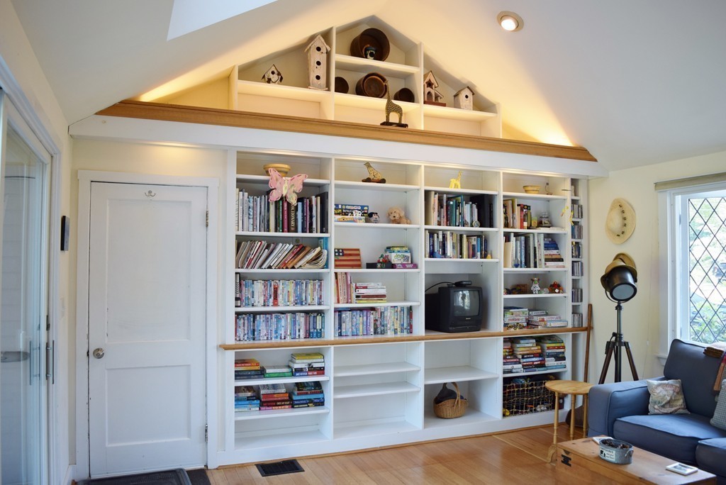 309 Red Acre Road Stow, MA 01775 - Photo 4 of 26 a living room with furniture and a book shelf